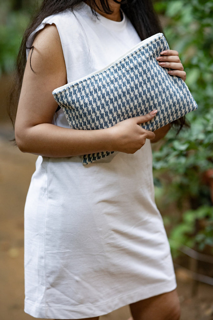 Polu Clutch Handbag